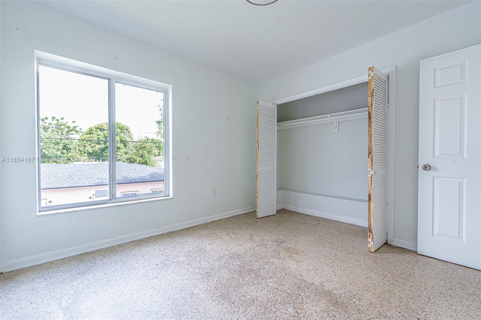 621 Southwest 15th Avenue, Unit 4 Miami, FL 33135 - Photo 15 of 22 an empty room with a window