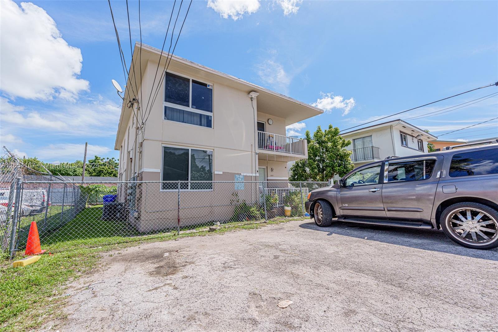 621 Southwest 15th Avenue, Unit 4 Miami, FL 33135 - Photo 3 of 22 a car parked in front of a house