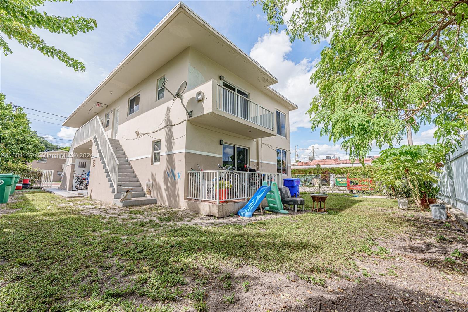 621 Southwest 15th Avenue, Unit 4 Miami, FL 33135 - Photo 4 of 22 a view of a house with a yard