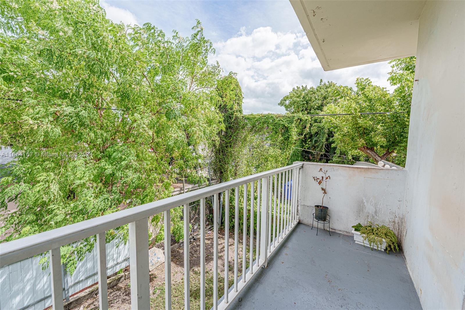 621 Southwest 15th Avenue, Unit 4 Miami, FL 33135 - Photo 5 of 22 a view of a balcony with an outdoor space