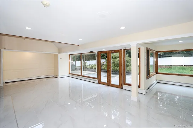 a view of an empty room with a stove