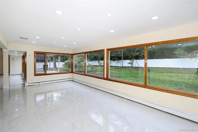 a view of a large room with a large window