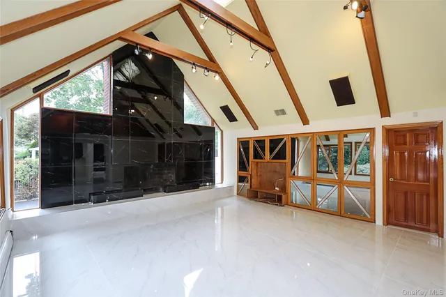 a view of a house with a large window