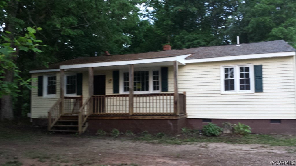 3564 Athey Road Sandy Hook, VA 23153 - Photo 1 of 12 a front view of a house with a yard