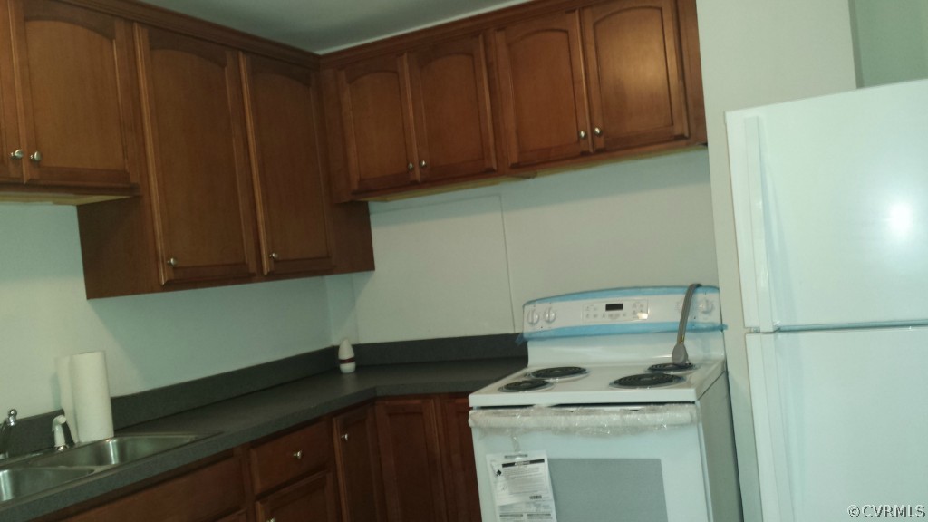 3564 Athey Road Sandy Hook, VA 23153 - Photo 5 of 12 a utility room with sink dryer and washer