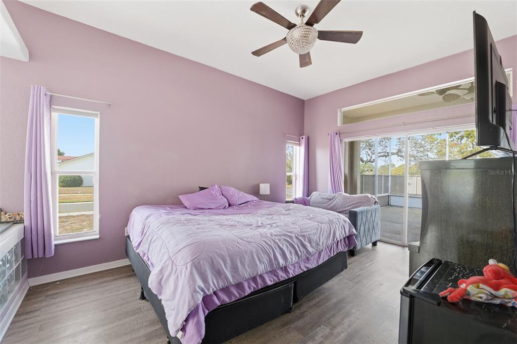 13403 Bolton Court Spring Hill, FL 34609 - Photo 12 of 36 a bedroom with a bed and a window