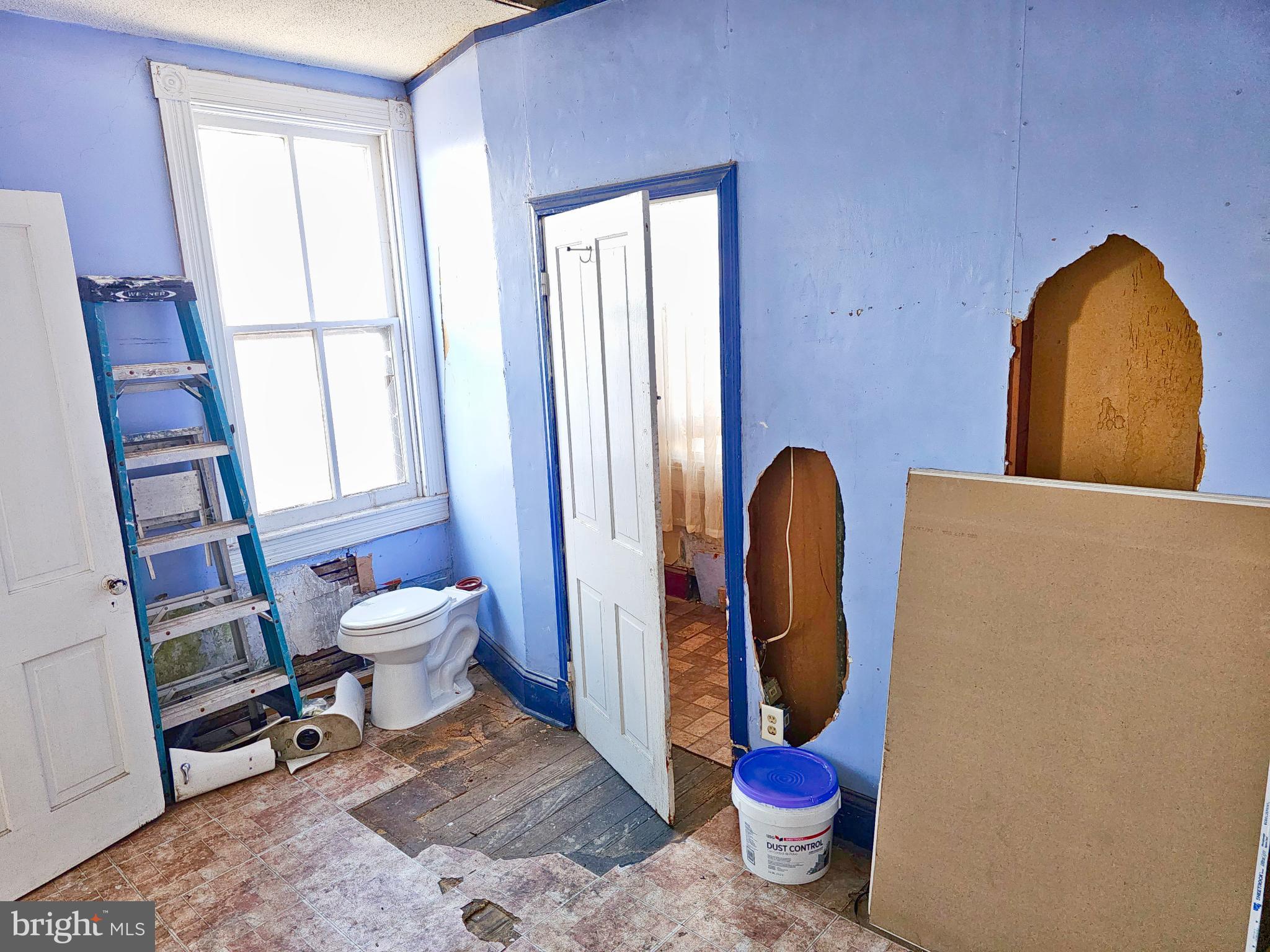 100 Pontiac Avenue Baltimore, MD 21225 - Photo 5 of 13 Renovation in progress: a room awaits transform...