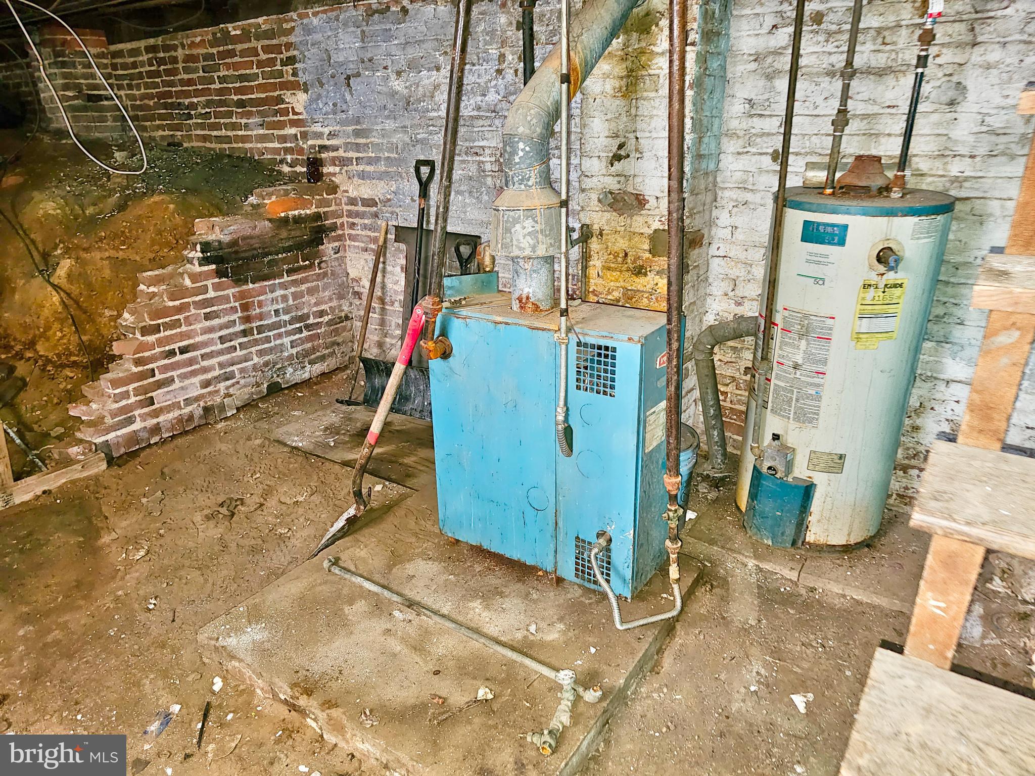 100 Pontiac Avenue Baltimore, MD 21225 - Photo 9 of 13 Utility area with heating equipment.