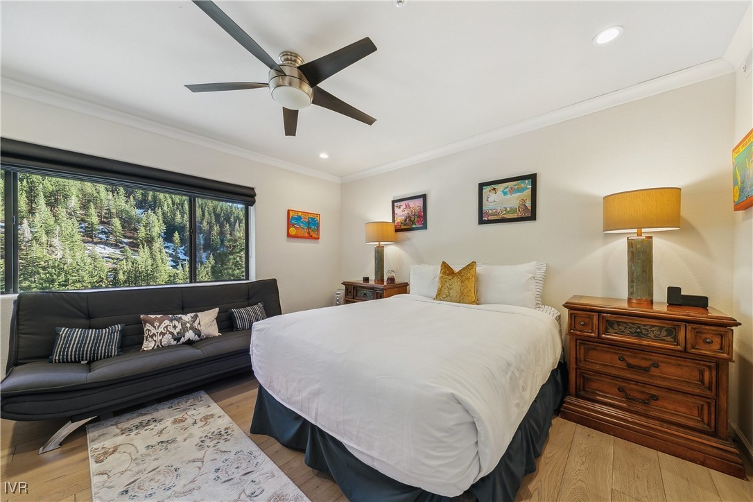 400 Fairview Boulevard, Unit 174 Incline Village, NV 89451 - Photo 21 of 30 a bedroom with a bed and wooden floor
