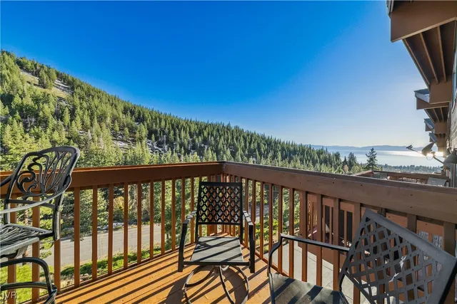 a view of balcony with wooden floor