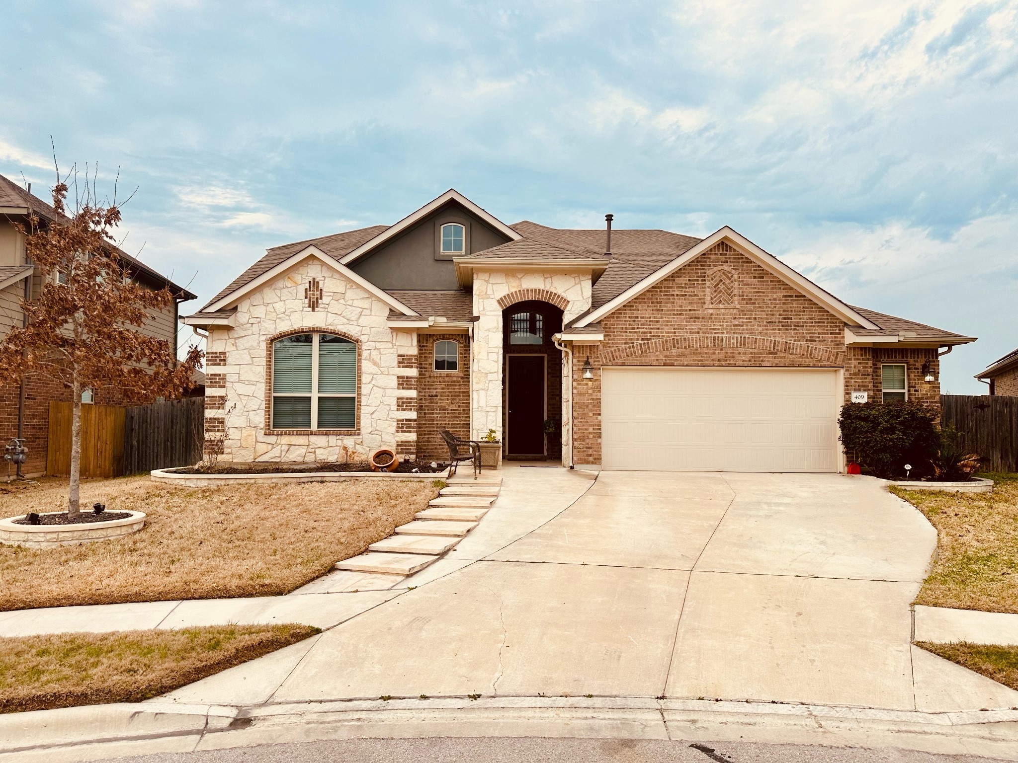 409 Betony Loop Buda, TX 78610 - Photo 4 of 27 Front view 4