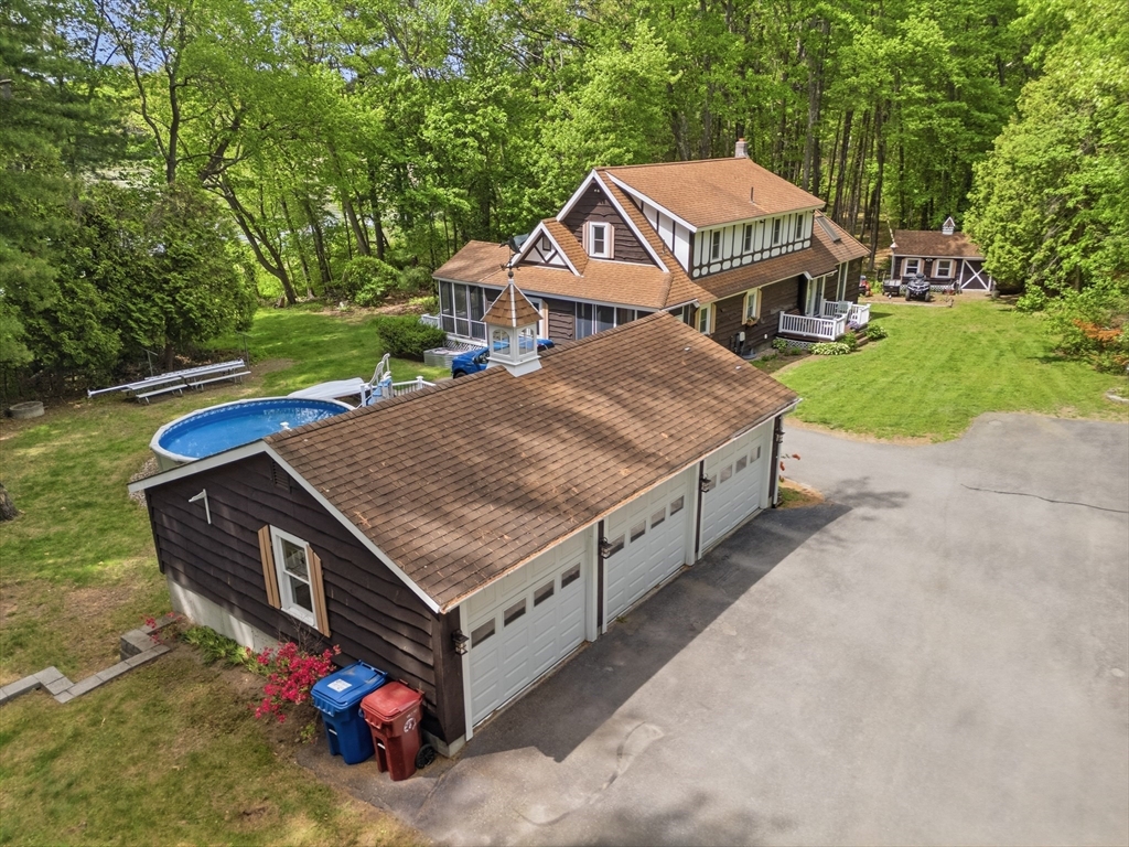 43 Flint Road Tyngsborough, MA 01879 - Photo 1 of 40 a aerial view of a house with a yard