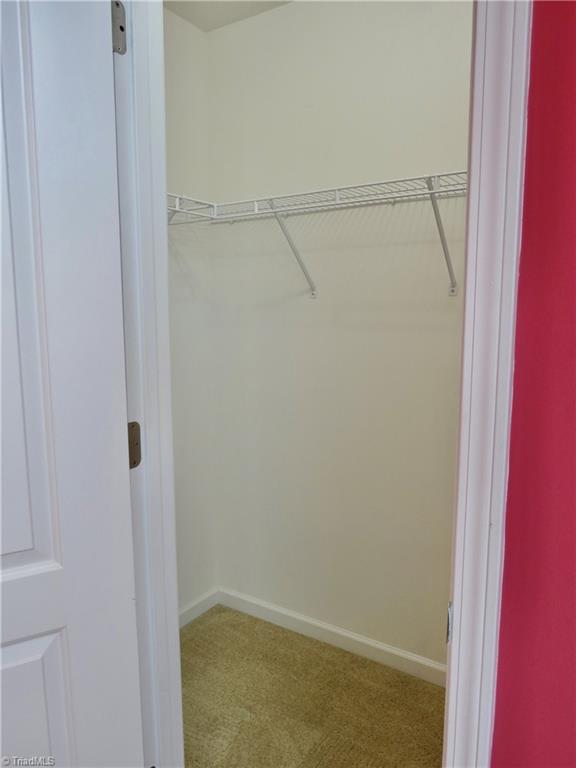 132 Feather Ridge Circle Reidsville, NC 27320 - Photo 23 of 42 Bedroom 2 walk in closet