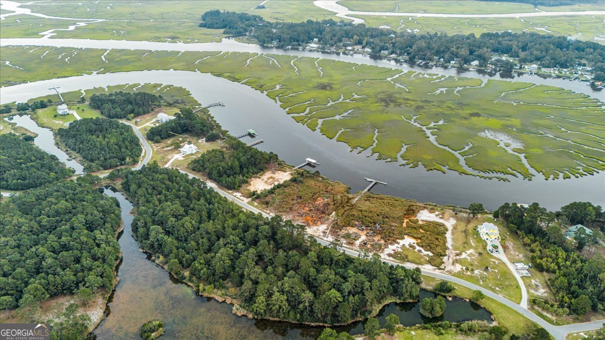 Lot 26 Jerico Marsh Road Midway, GA 31320 - Photo 20 of 24 a view of a lake with a mountain