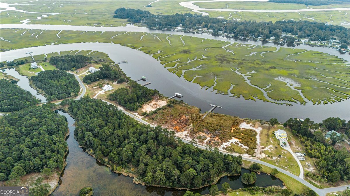 Lot 26 Jerico Marsh Road Midway, GA 31320 - Photo 22 of 24 a view of a lake with a mountain