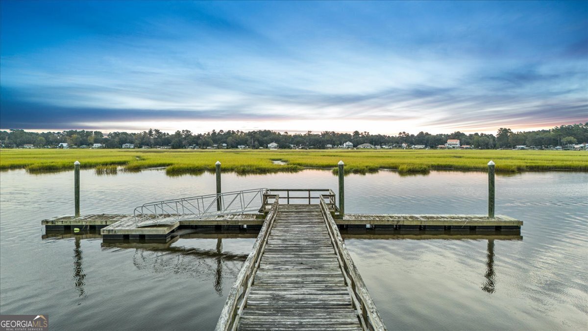 Lot 26 Jerico Marsh Road Midway, GA 31320 - Photo 4 of 24 a view of a lake with houses in the back