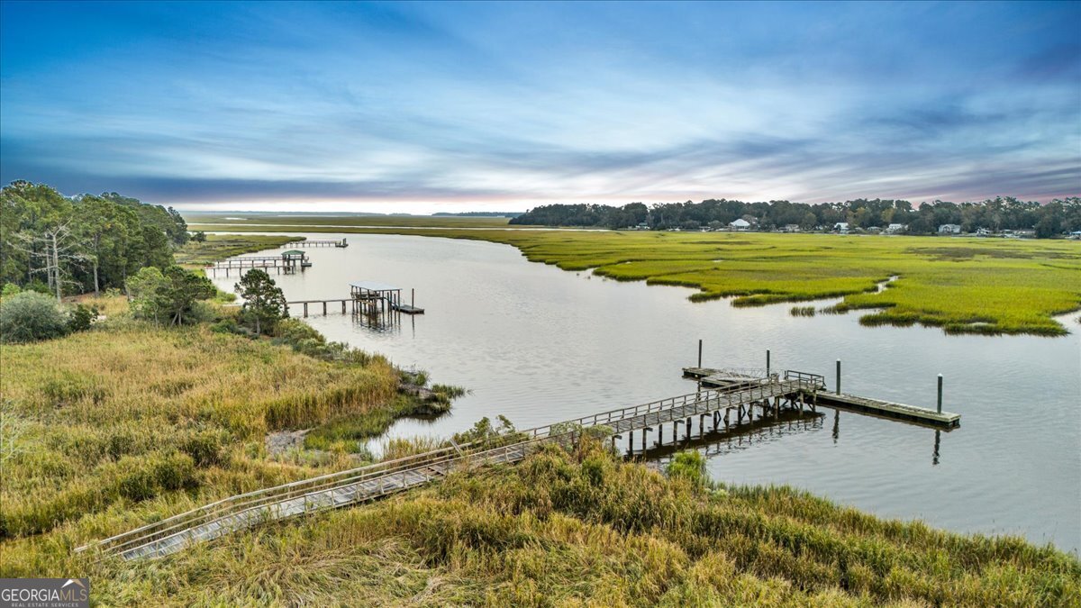 Lot 26 Jerico Marsh Road Midway, GA 31320 - Photo 8 of 24 a view of an ocean and beach