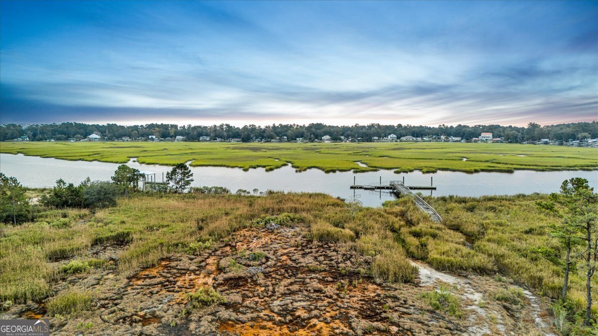 Lot 26 Jerico Marsh Road Midway, GA 31320 - Photo 10 of 24 a view of a lake with a city