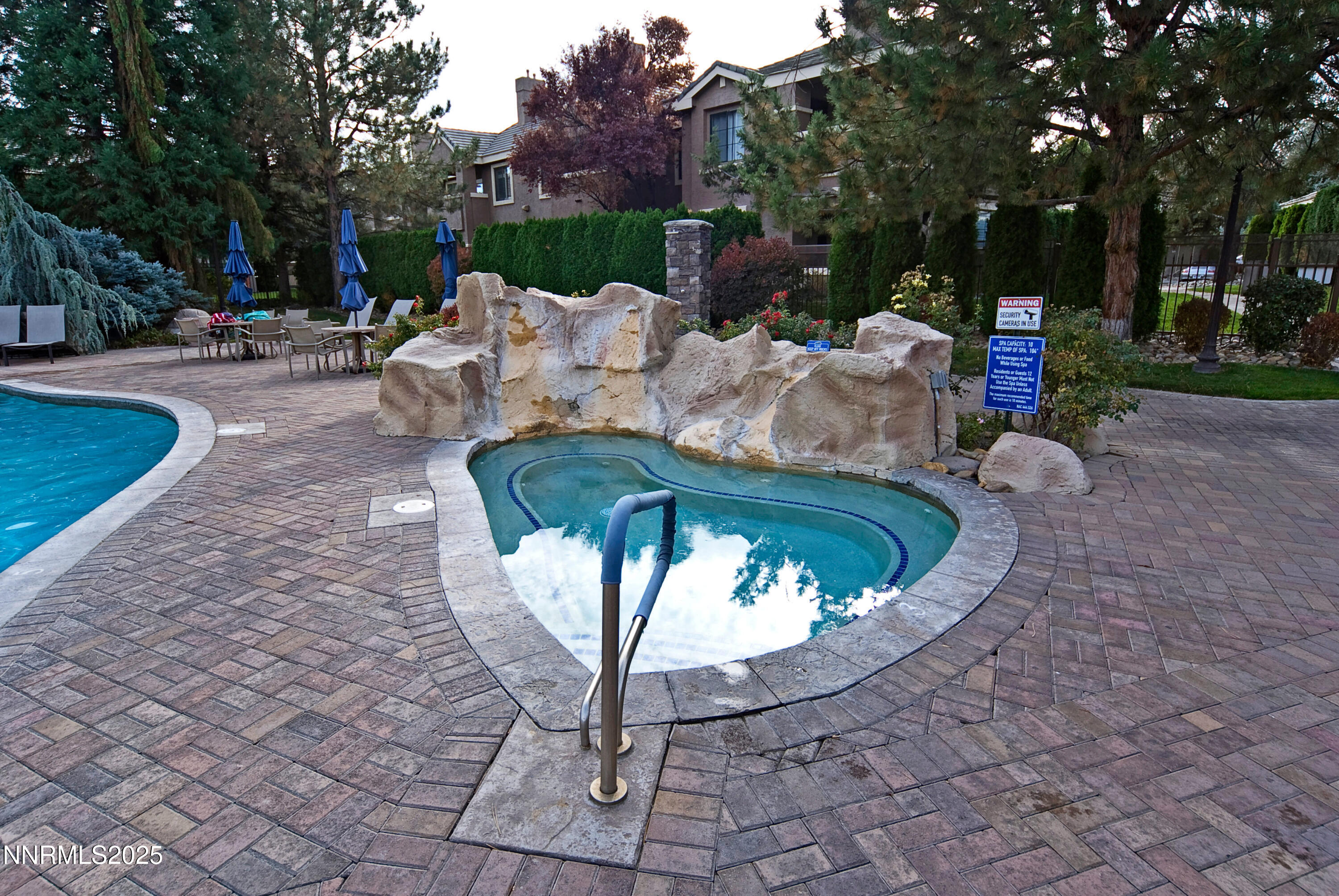 900 South Meadows Parkway, Unit 3522 Reno, NV 89521 - Photo 12 of 24 a view of a swimming pool with sitting area
