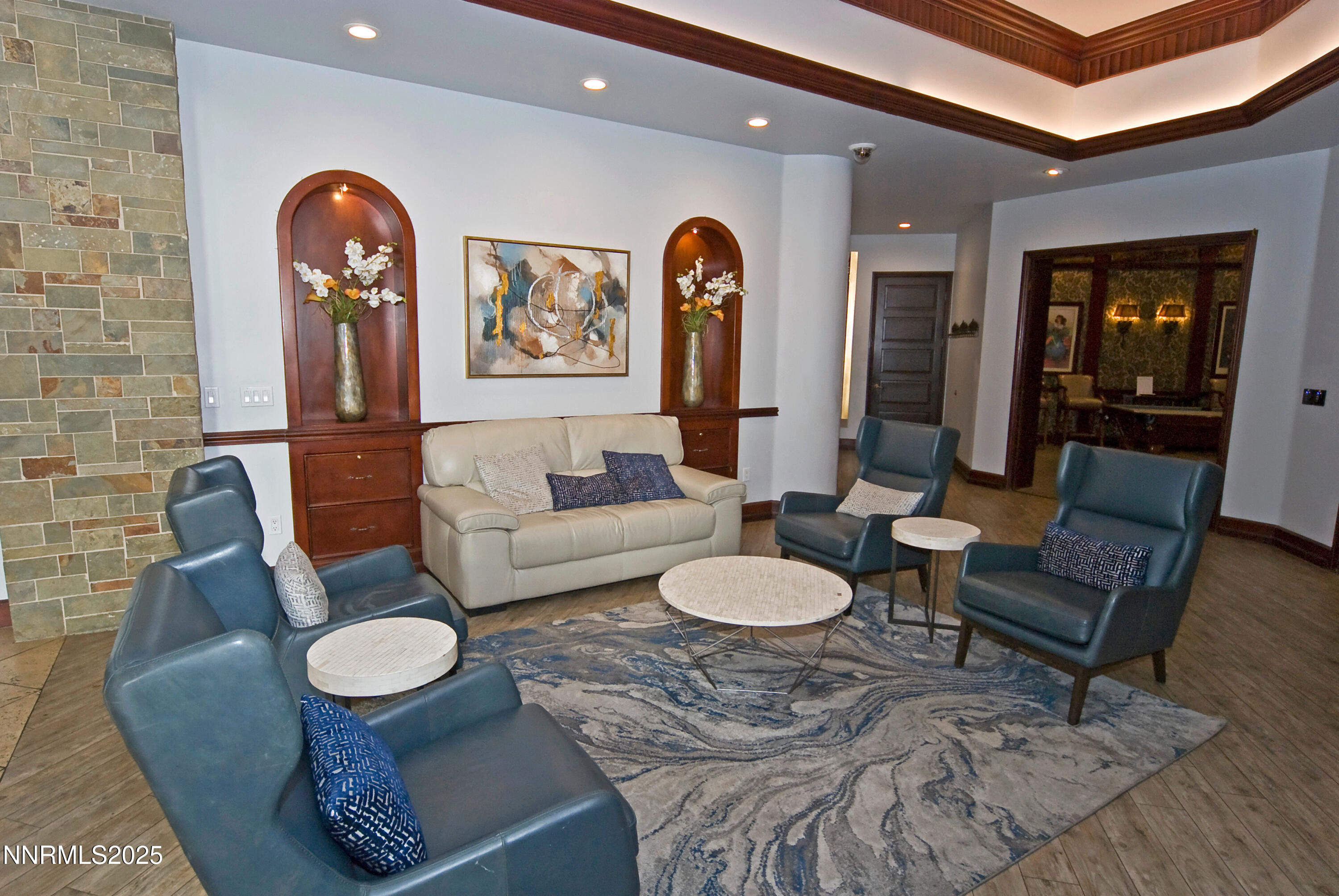 900 South Meadows Parkway, Unit 3522 Reno, NV 89521 - Photo 20 of 24 a living room with furniture and wooden floor