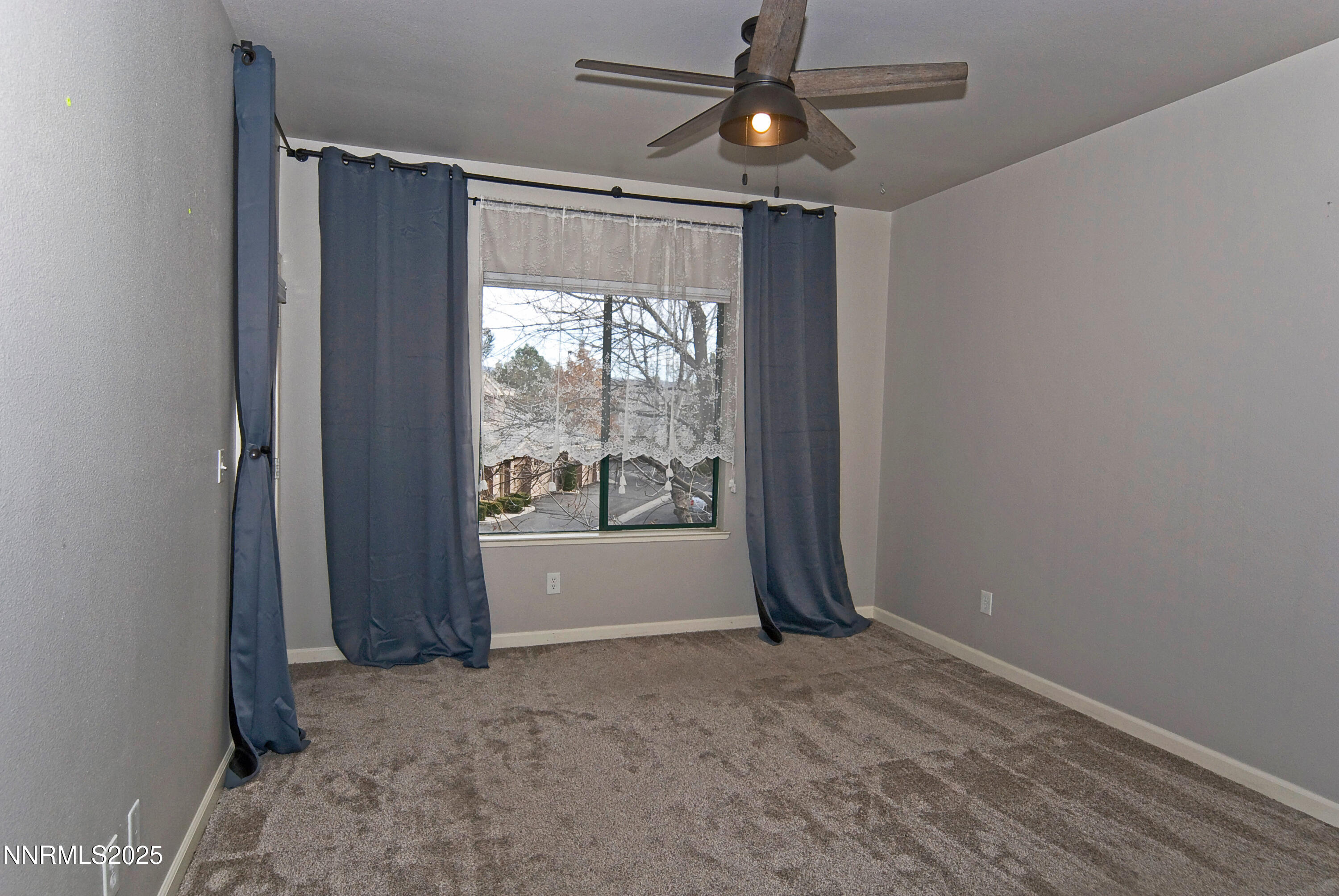 900 South Meadows Parkway, Unit 3522 Reno, NV 89521 - Photo 3 of 24 an empty room with windows and entrance