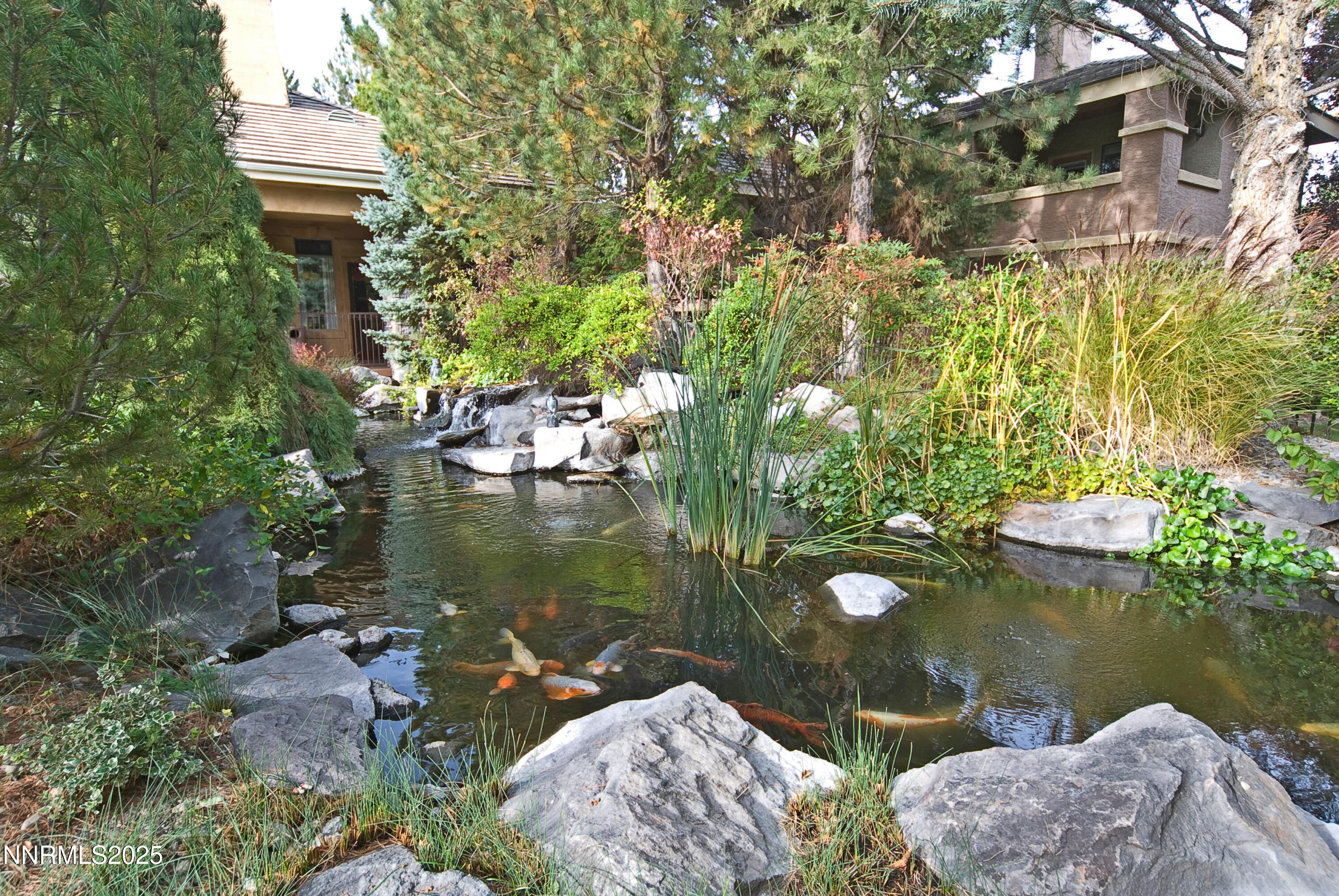 900 South Meadows Parkway, Unit 3522 Reno, NV 89521 - Photo 10 of 24 a lake view with a house in the background