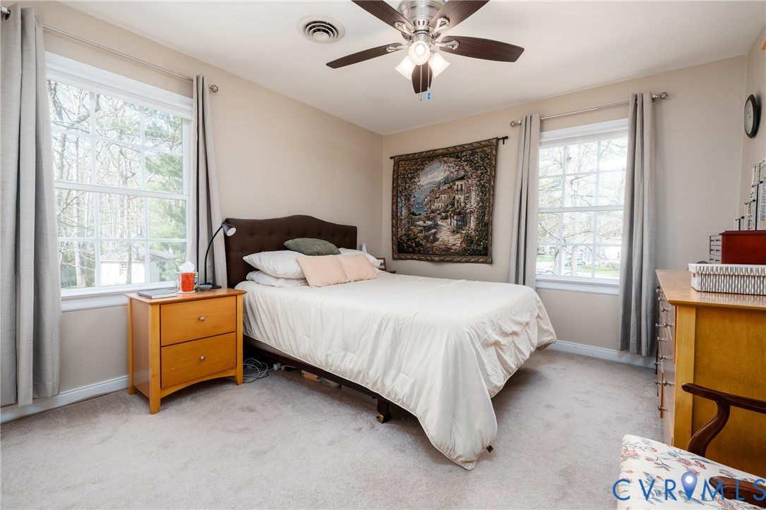 11801 Wiesinger Lane Midlothian, VA 23113 - Photo 23 of 34 a bed room with a bed and a window