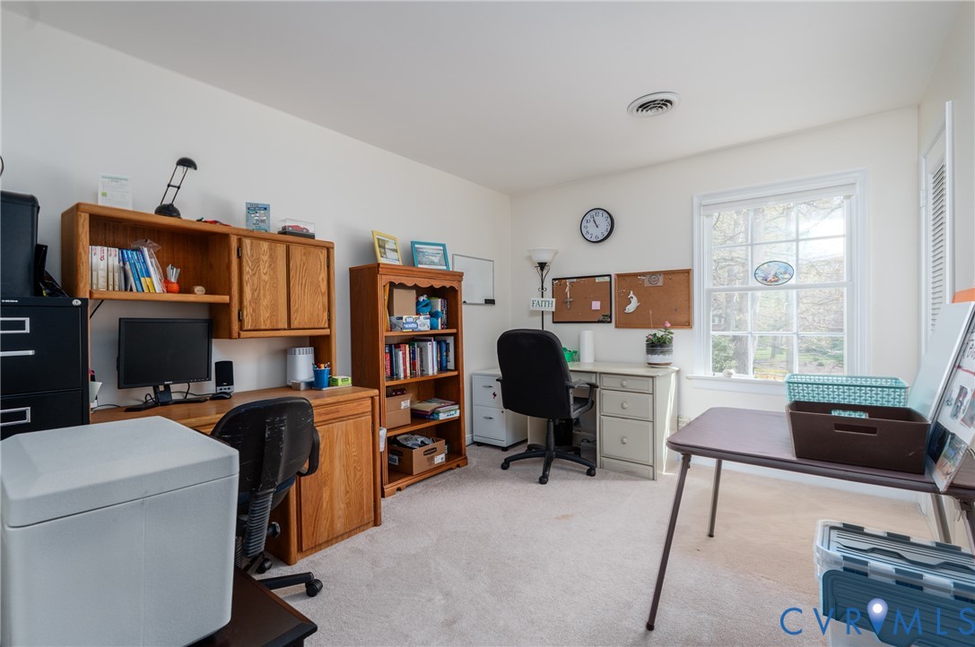 11801 Wiesinger Lane Midlothian, VA 23113 - Photo 26 of 34 a view of a workspace with furniture and a window