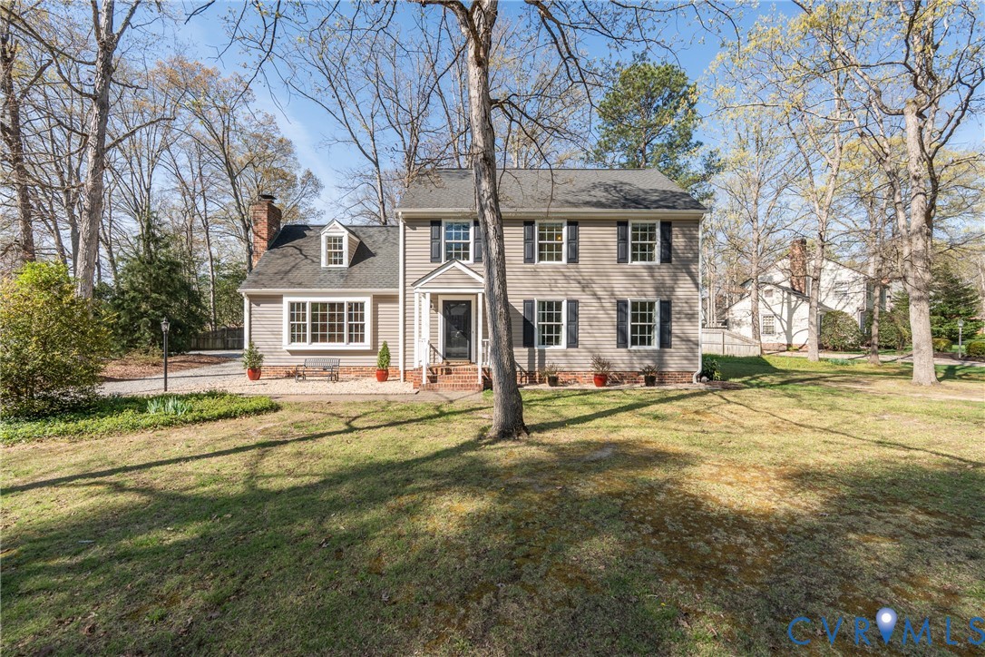 11801 Wiesinger Lane Midlothian, VA 23113 - Photo 34 of 34 a front view of a house with a yard