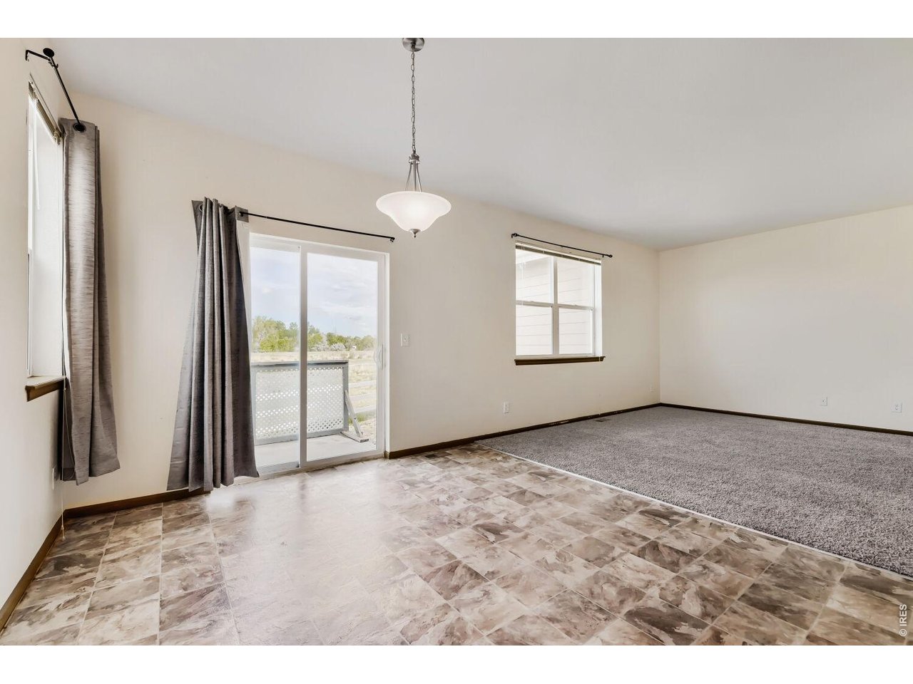 369 Naples Street Firestone, CO 80520 - Photo 15 of 29 Dining and Living Room