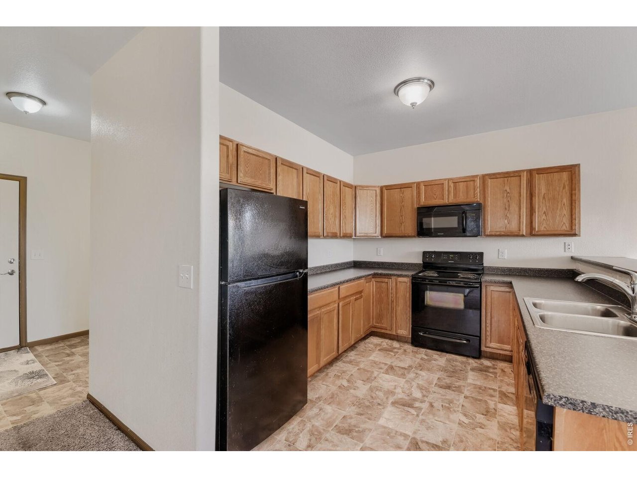 369 Naples Street Firestone, CO 80520 - Photo 2 of 29 Kitchen off of Entry