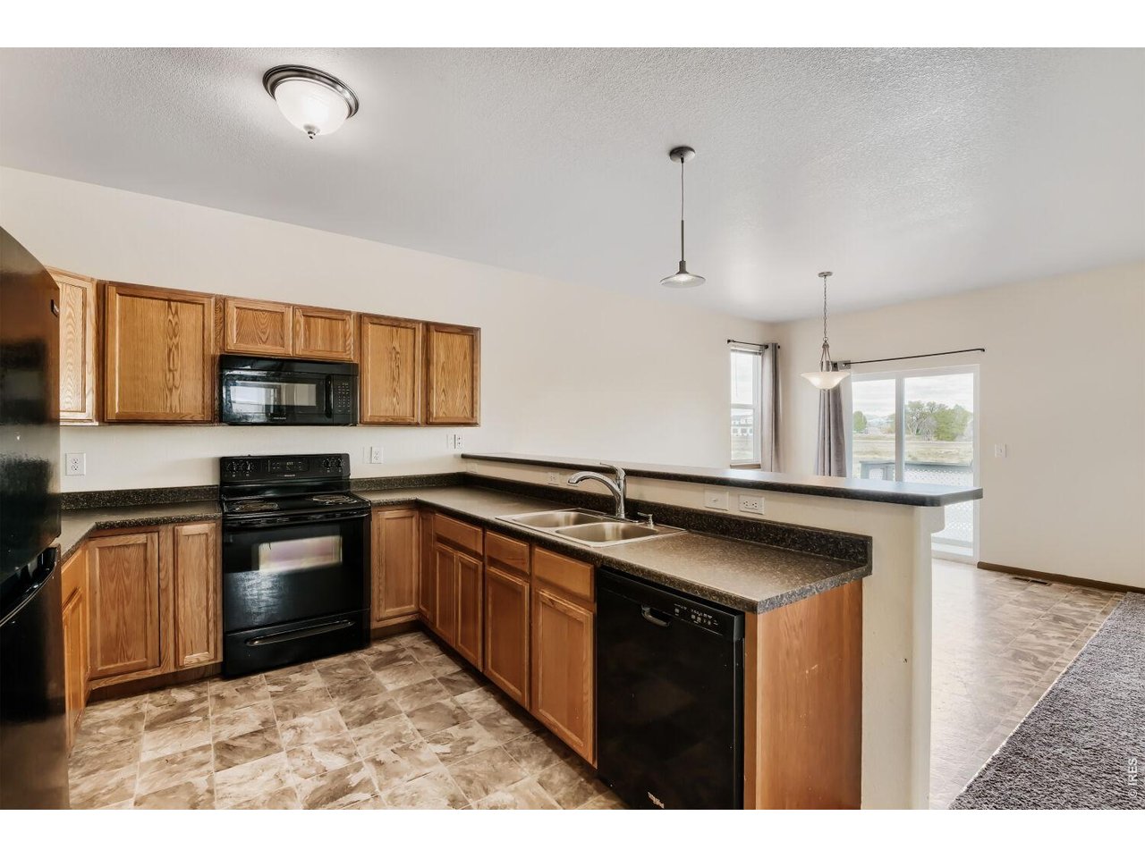 369 Naples Street Firestone, CO 80520 - Photo 3 of 29 Kitchen and Dining Area