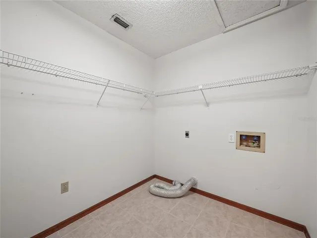 a view of a room with racks on the wall