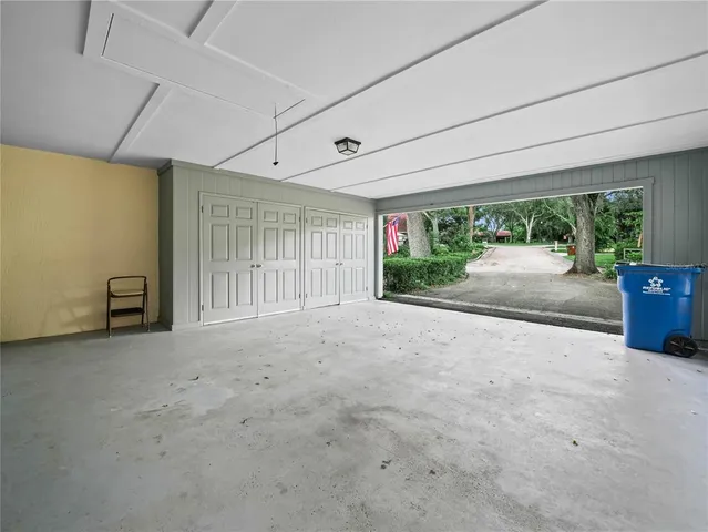 an aerial view of a house with a garden