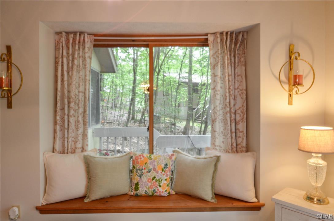 208 Regent Street Bushkill, PA 18324 - Photo 11 of 37 a living room with furniture and a window