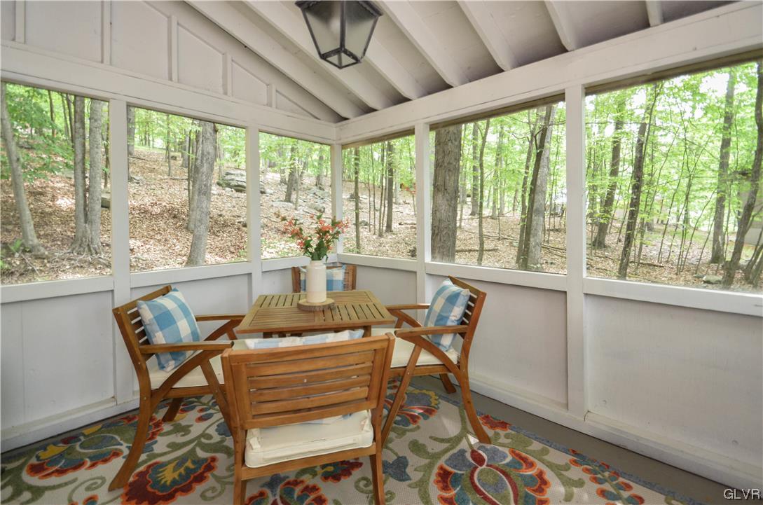 208 Regent Street Bushkill, PA 18324 - Photo 15 of 37 a dining room with furniture a chandelier and wooden floor