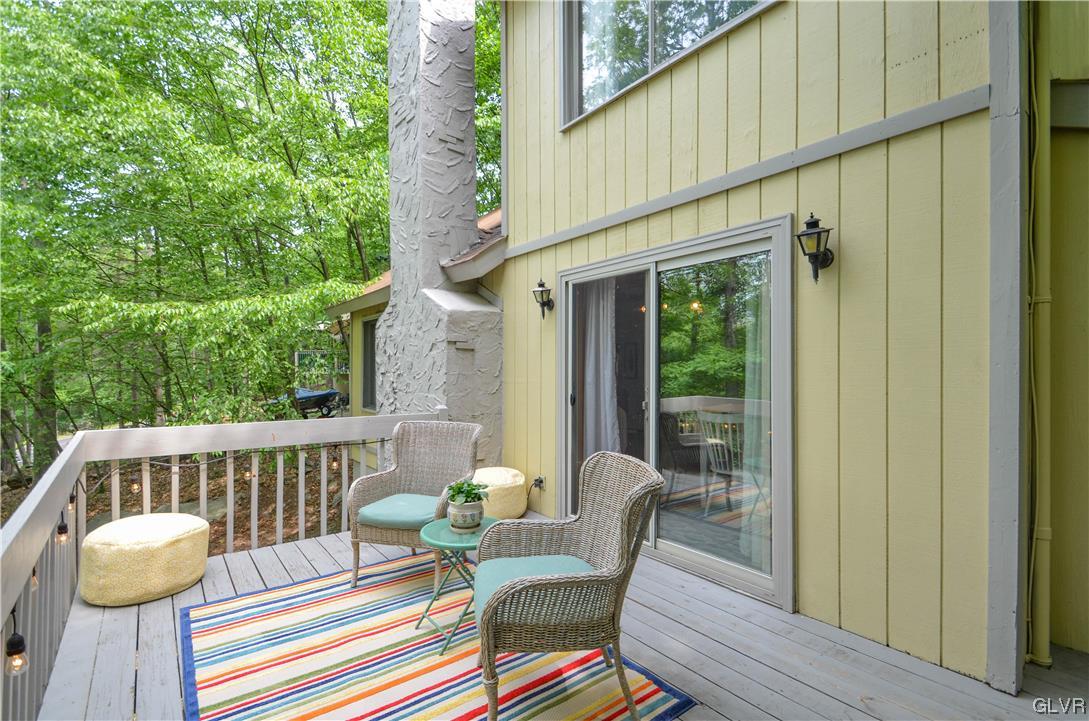 208 Regent Street Bushkill, PA 18324 - Photo 2 of 37 a view of a chair and table in the balcony