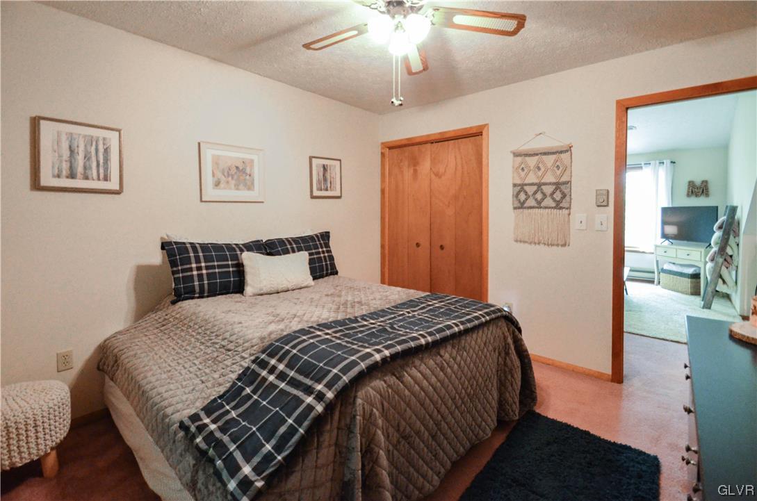 208 Regent Street Bushkill, PA 18324 - Photo 26 of 37 a bedroom with bed and night stand