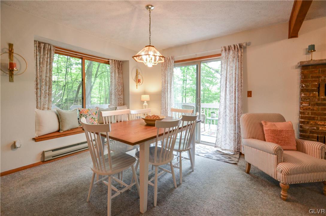208 Regent Street Bushkill, PA 18324 - Photo 8 of 37 a view of a dining room with furniture window and outside view