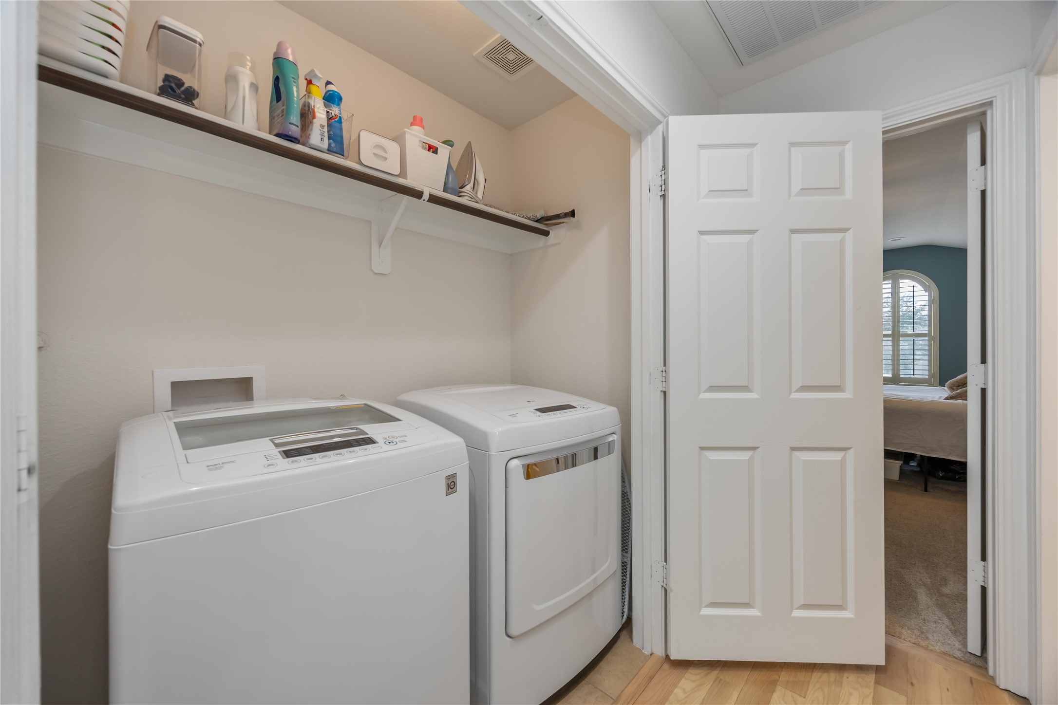 2019 Falcon Reach Drive Houston, TX 77080 - Photo 17 of 30 a utility room with dryer and washer