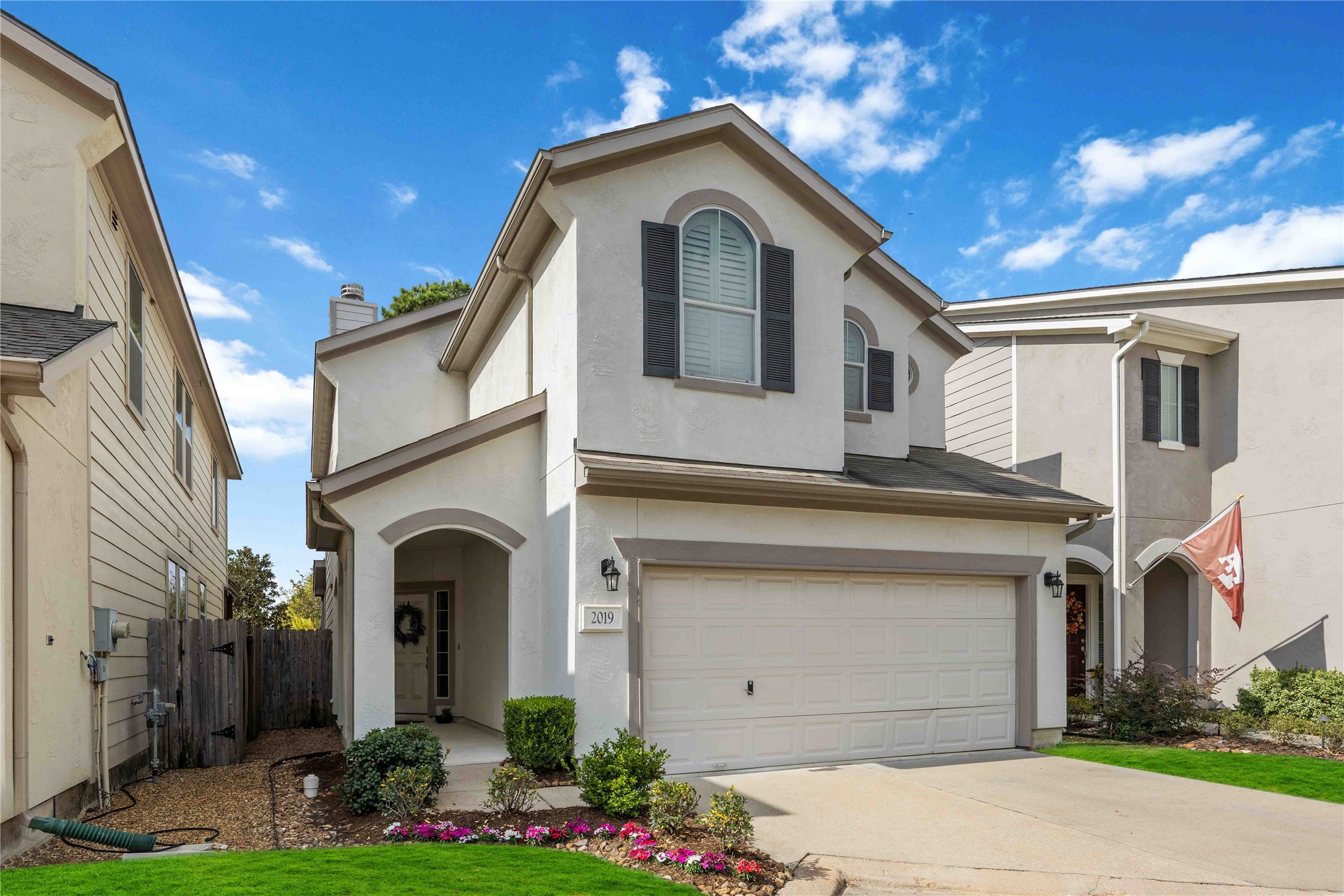 2019 Falcon Reach Drive Houston, TX 77080 - Photo 2 of 30 a view of a house with a small yard