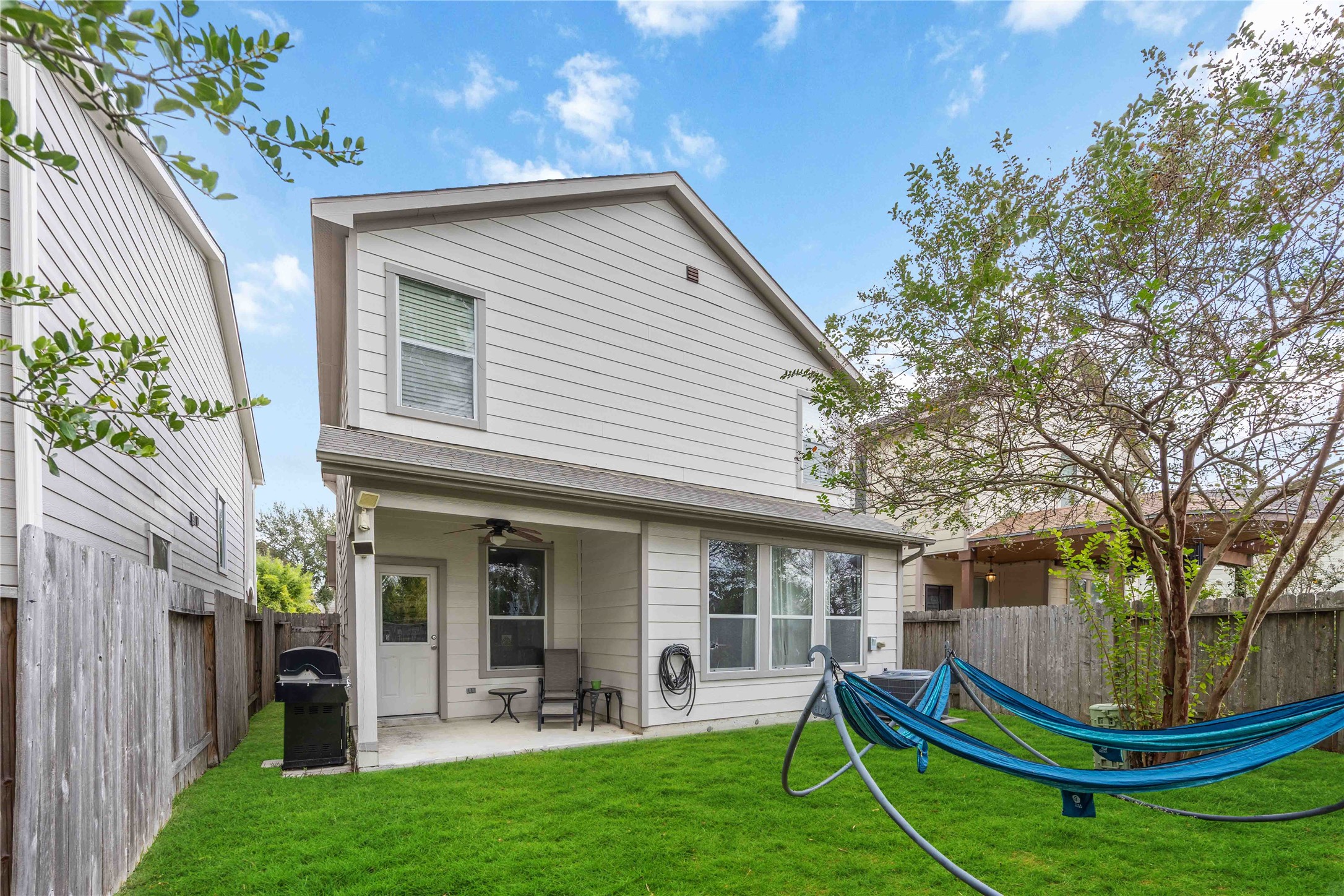 2019 Falcon Reach Drive Houston, TX 77080 - Photo 30 of 30 a view of a house with backyard porch and sitting area