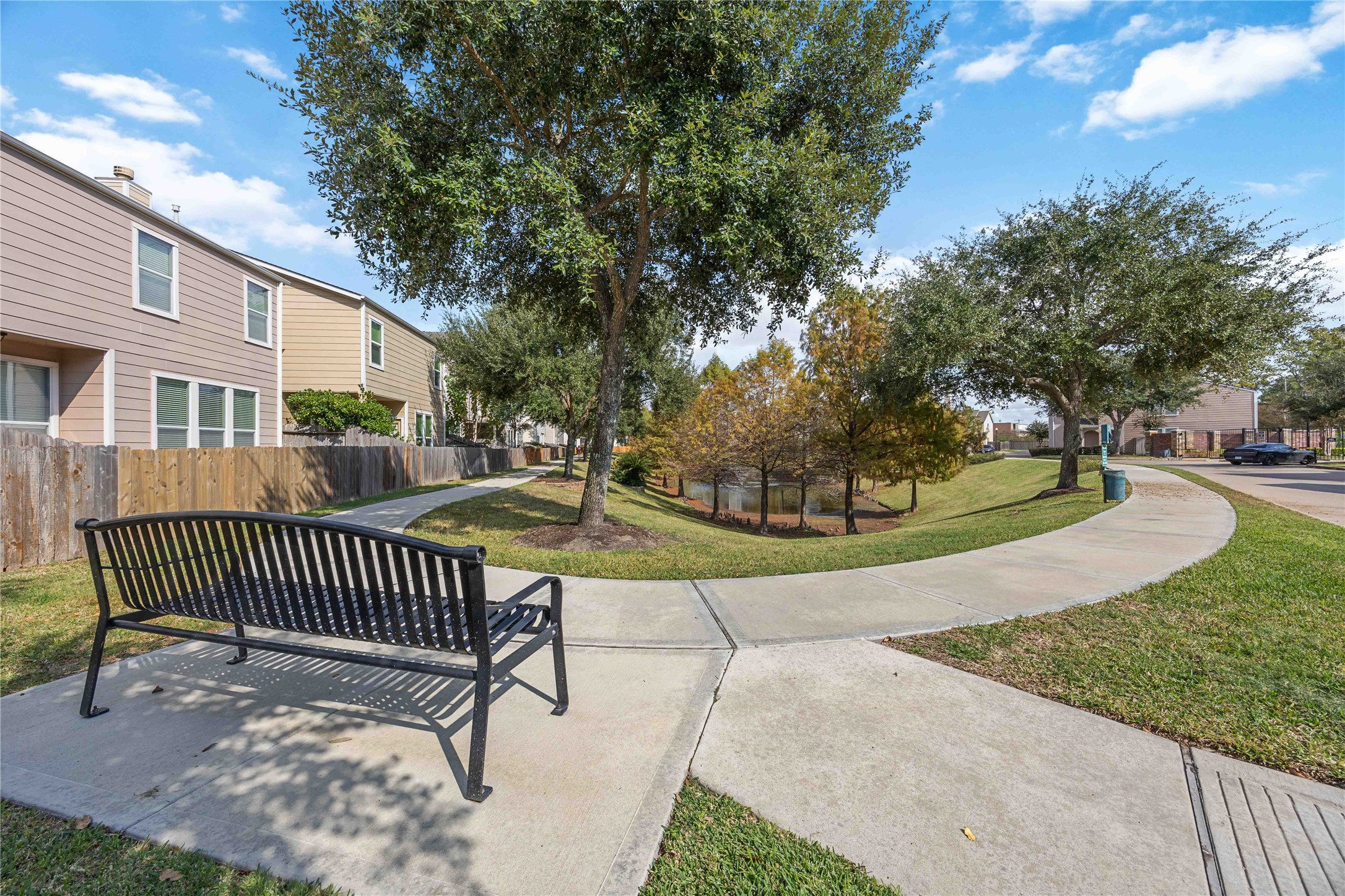 2019 Falcon Reach Drive Houston, TX 77080 - Photo 4 of 30 a view of a bench in a backyard
