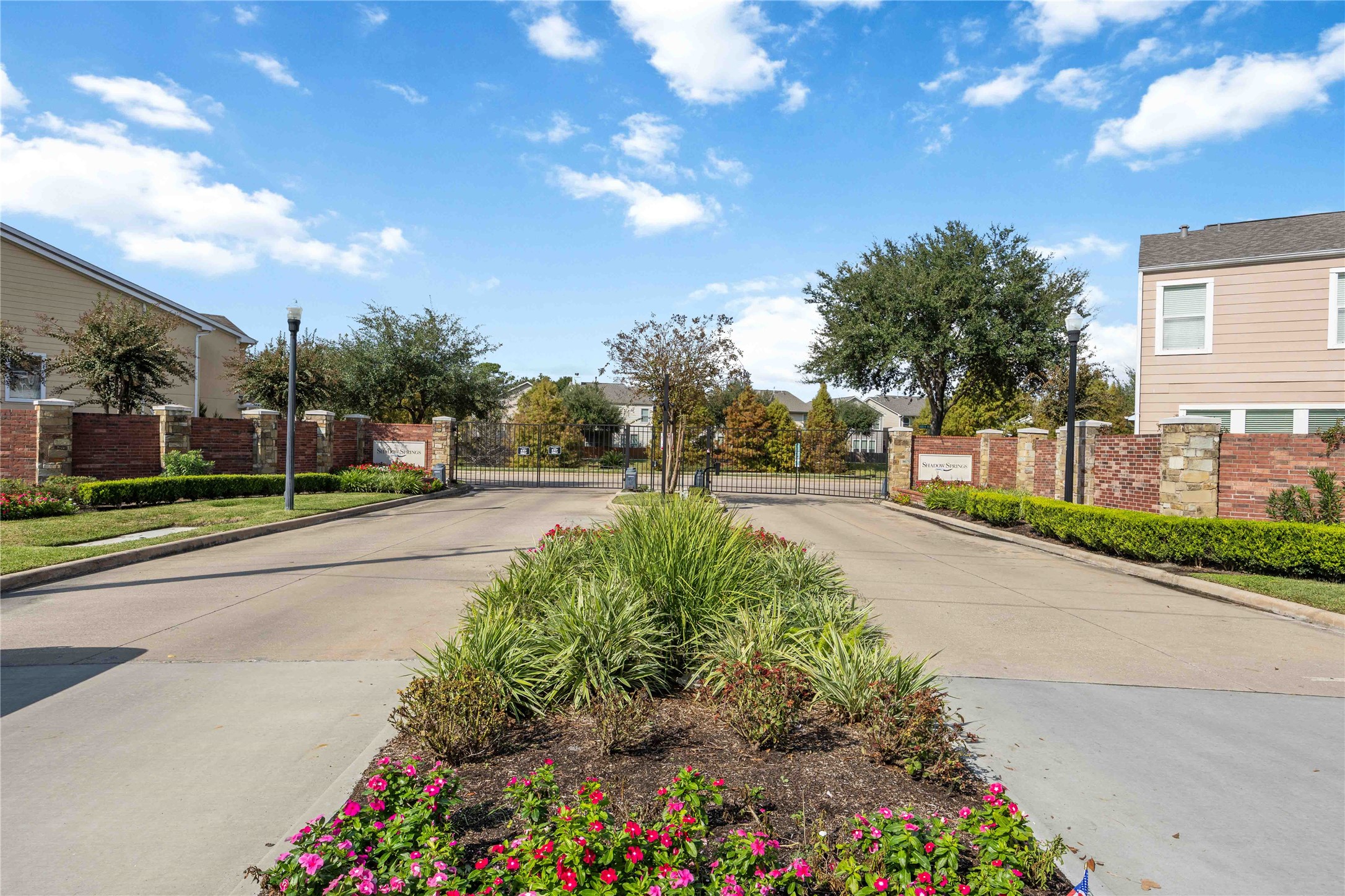 2019 Falcon Reach Drive Houston, TX 77080 - Photo 5 of 30 a view of street with flower on side of it