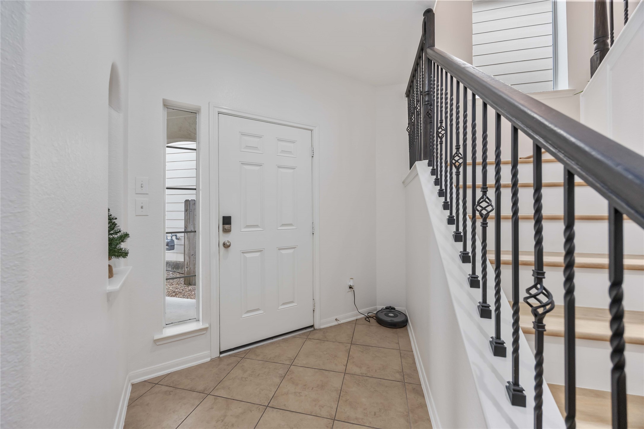 2019 Falcon Reach Drive Houston, TX 77080 - Photo 6 of 30 a view of an entryway with staircase