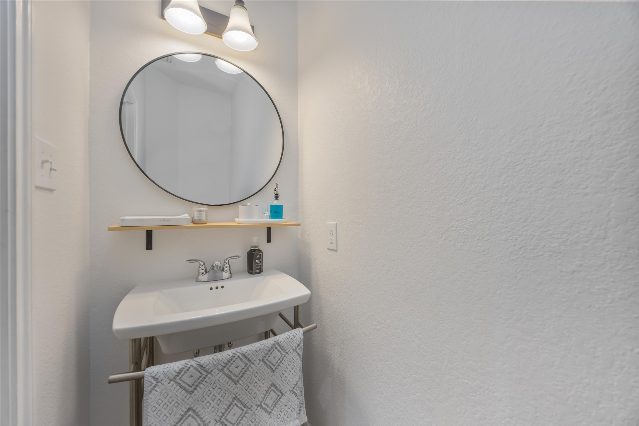 2019 Falcon Reach Drive Houston, TX 77080 - Photo 7 of 30 a bathroom with a sink and a mirror