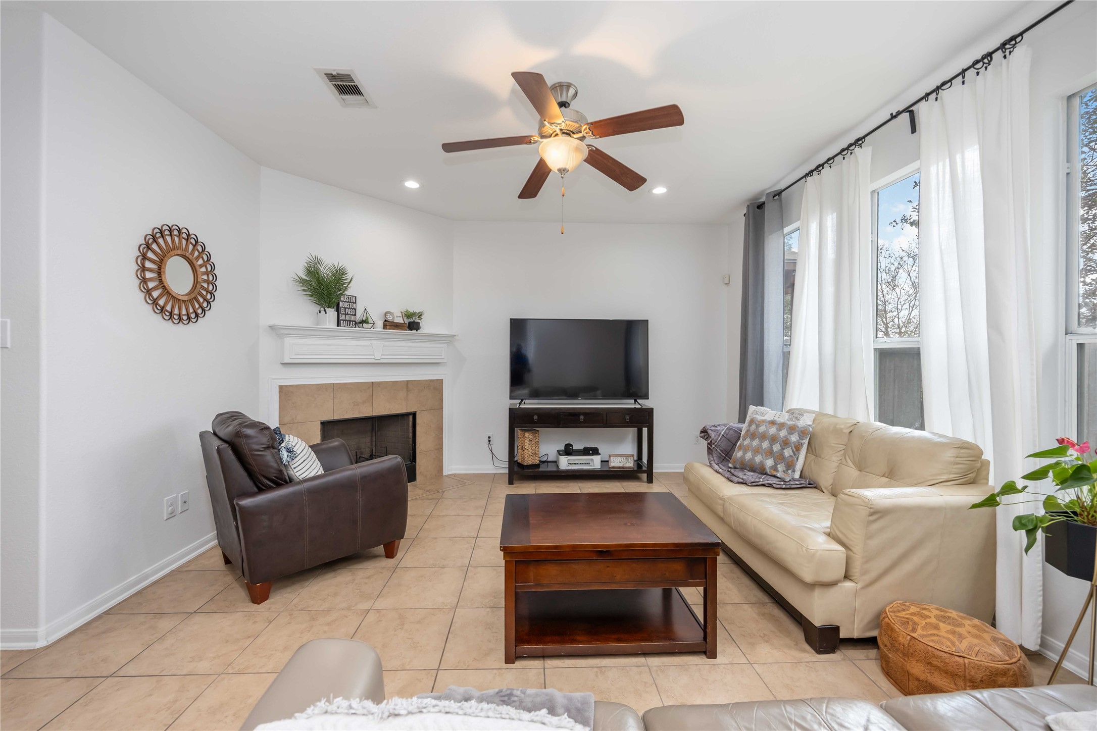 2019 Falcon Reach Drive Houston, TX 77080 - Photo 9 of 30 a living room with furniture and a fireplace