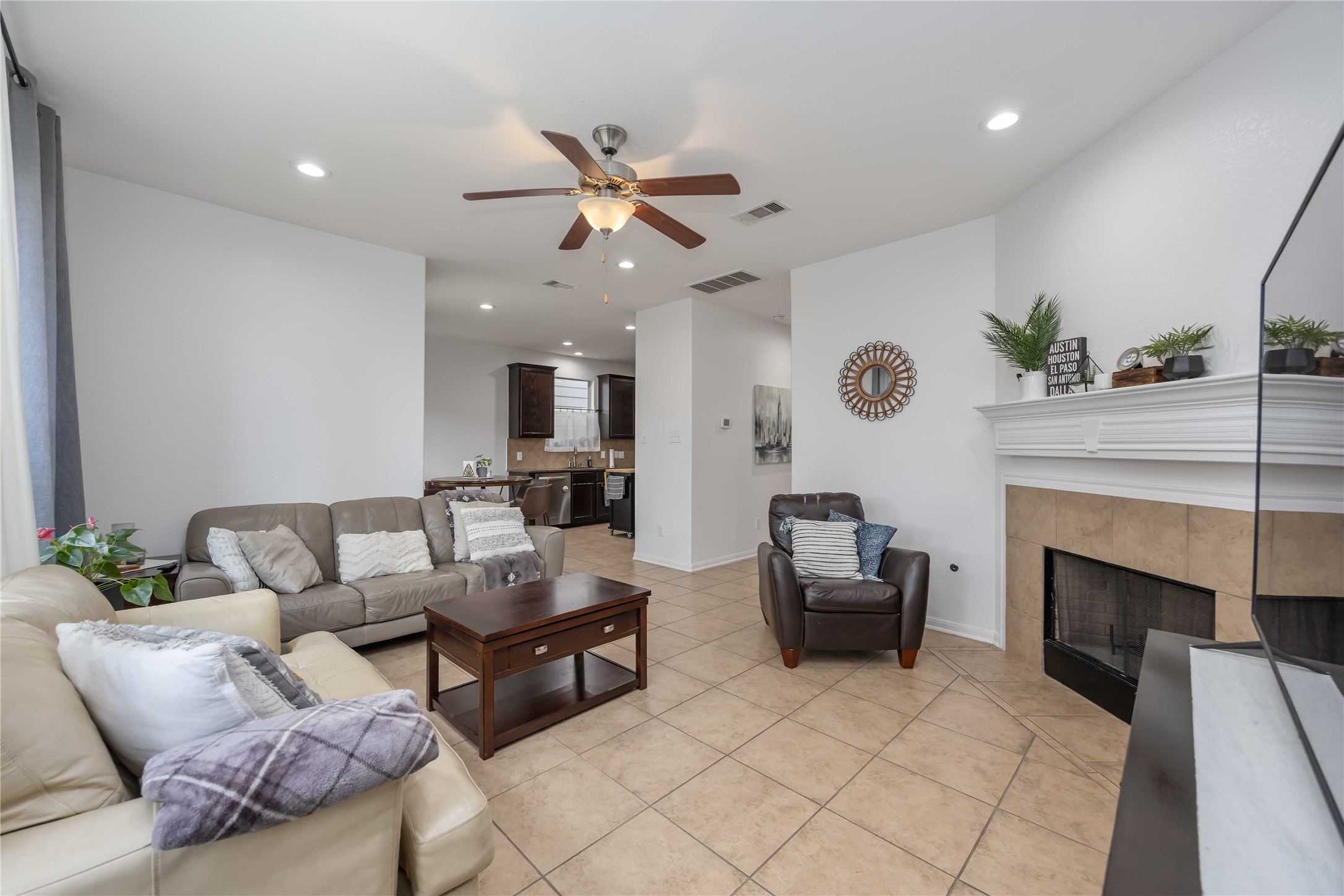 2019 Falcon Reach Drive Houston, TX 77080 - Photo 10 of 30 a living room with furniture and a fireplace