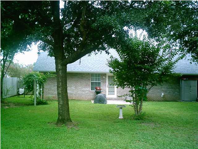 105 Steeplechase Drive Crestview, FL 32539 - Photo 11 of 11 a view of a house with a backyard