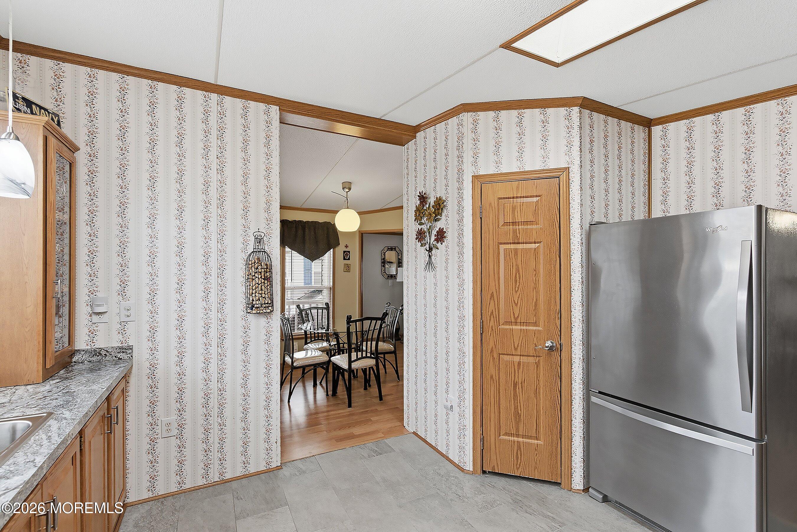 536 Momosa Way Whiting, NJ 08759 - Photo 18 of 54 a kitchen with stainless steel appliances granite countertop a refrigerator and a sink